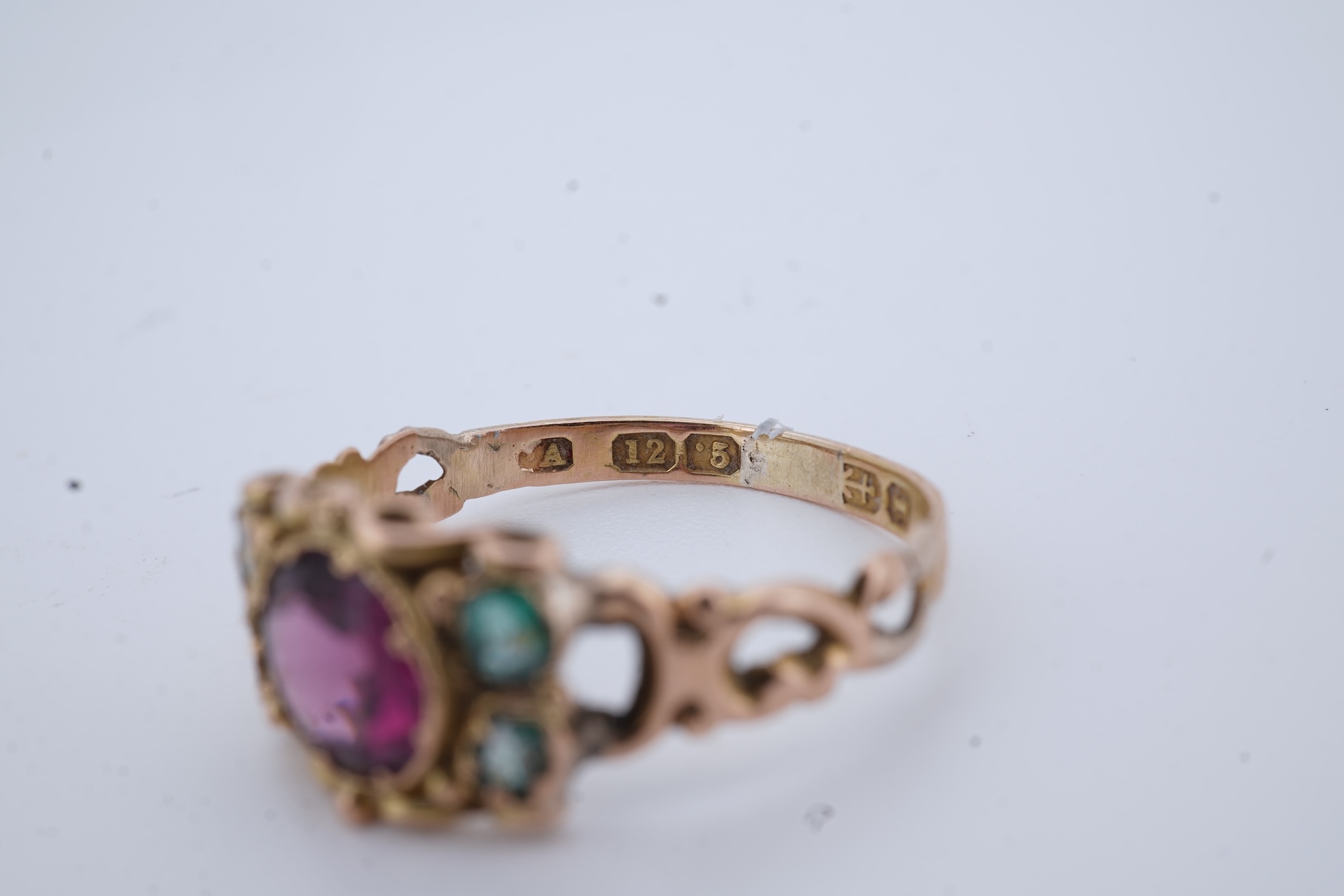 A Victorian garnet and paste ring, circa 1857